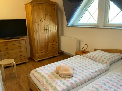 Ein Bett oder Betten in einem Zimmer der Unterkunft Strandmuschel