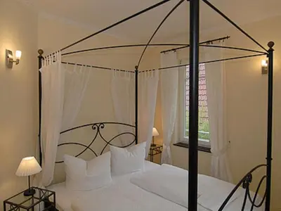 Ein Bett oder Betten in einem Zimmer der Unterkunft Burg Roland Wohnung 04
