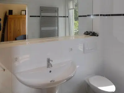 Ein Badezimmer in der Unterkunft Burg Roland Wohnung 04