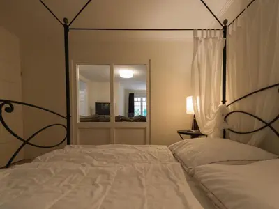 Ein Bett oder Betten in einem Zimmer der Unterkunft Burg Roland Wohnung 05