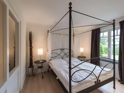 Ein Bett oder Betten in einem Zimmer der Unterkunft Burg Roland Wohnung 05