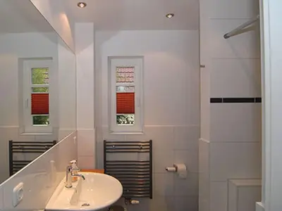 Ein Badezimmer in der Unterkunft Burg Roland Wohnung 05