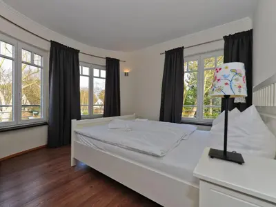 Ein Bett oder Betten in einem Zimmer der Unterkunft Burg Roland Wohnung 06