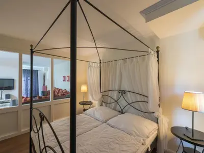 Ein Bett oder Betten in einem Zimmer der Unterkunft Burg Roland Wohnung 06