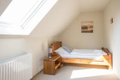 Ein Bett oder Betten in einem Zimmer der Unterkunft Ferienhaus WERDER