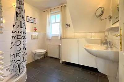 Ein Badezimmer in der Unterkunft Ferienhaus WERDER
