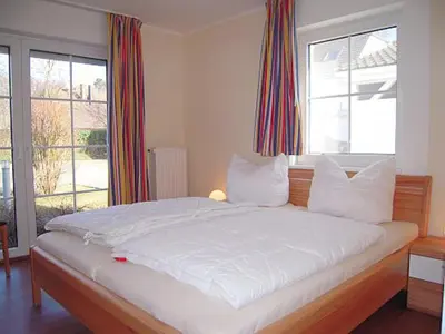 Ein Bett oder Betten in einem Zimmer der Unterkunft Haus Seeblick 6