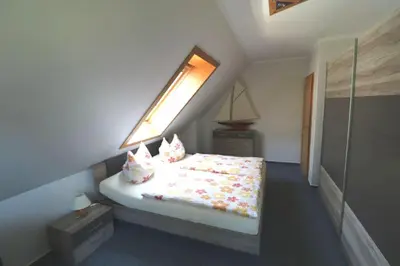 Ein Bett oder Betten in einem Zimmer der Unterkunft Applers Fewo