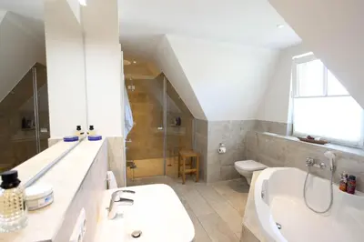 Ein Badezimmer in der Unterkunft Seeschwalbe 5 - Sauna & Kamin am Bodden