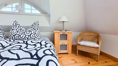 Ein Bett oder Betten in einem Zimmer der Unterkunft Tandem Felix - Ferienhaus in Zingst für bis zu 6 Personen
