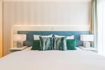 Ein Bett oder Betten in einem Zimmer der Unterkunft Am Park 2