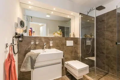 Ein Badezimmer in der Unterkunft Am Park 13