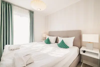 Ein Bett oder Betten in einem Zimmer der Unterkunft Am Park 11