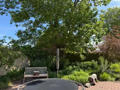 Ein Garten an der Unterkunft Ferienwohnung Rosengarten