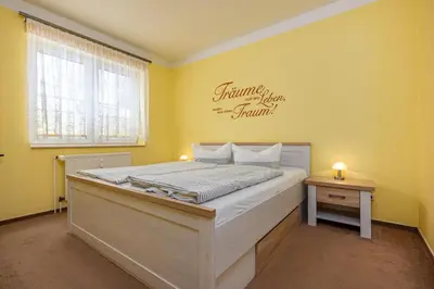 Ein Bett oder Betten in einem Zimmer der Unterkunft Birkenstraße 14a Charlotte
