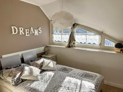 Ein Bett oder Betten in einem Zimmer der Unterkunft Birkenstraße 5d Villa Mar Baltico