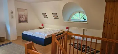 Ein Bett oder Betten in einem Zimmer der Unterkunft Achtern Diek 12b - Wohnung 6