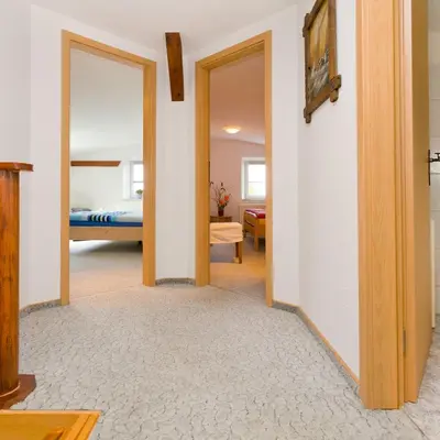 Ein Bett oder Betten in einem Zimmer der Unterkunft Ferienwohnung Meeresbrise