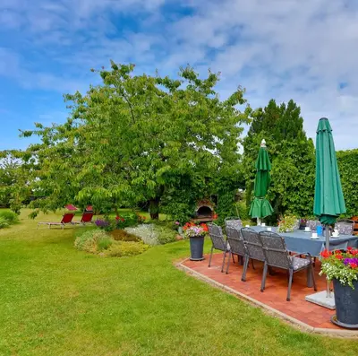 Ein Garten an der Unterkunft Ferienwohnung Meeresbrise