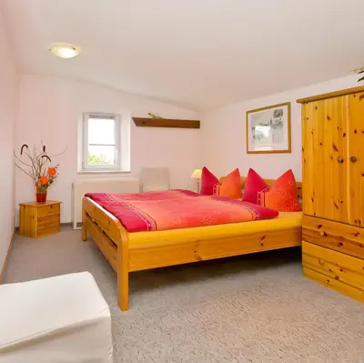 Ein Bett oder Betten in einem Zimmer der Unterkunft Ferienwohnung Meeresbrise