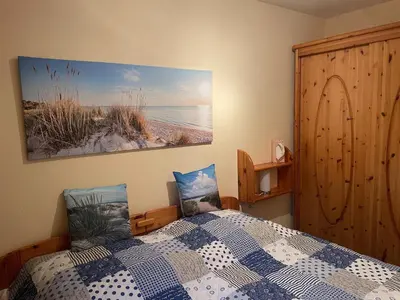 Ein Bett oder Betten in einem Zimmer der Unterkunft Wohnung Bodden 1