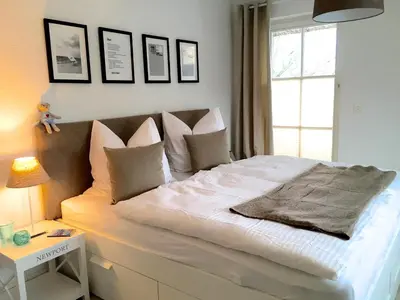 Ein Bett oder Betten in einem Zimmer der Unterkunft Ferienwohnung Schwalbe Wieck/Darss
