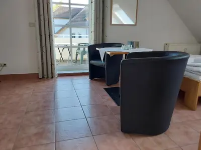 Ein Sitzbereich in der Unterkunft Parkresidenz Dierhagen