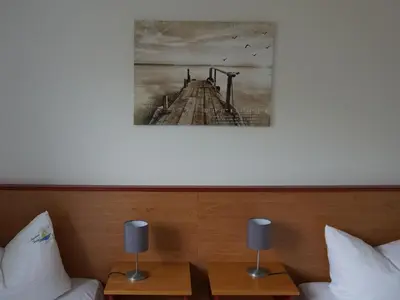 Ein Bett oder Betten in einem Zimmer der Unterkunft Parkresidenz Dierhagen