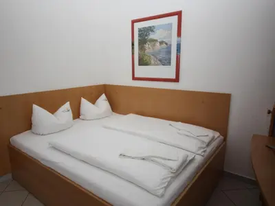 Ein Bett oder Betten in einem Zimmer der Unterkunft Parkresidenz Dierhagen