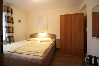 Ein Bett oder Betten in einem Zimmer der Unterkunft Feriendomizil am Hafen