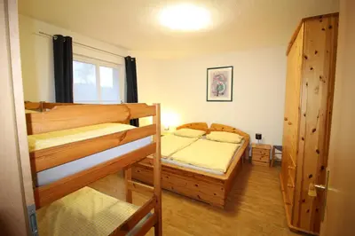 Ein Bett oder Betten in einem Zimmer der Unterkunft Feriendomizil am Hafen