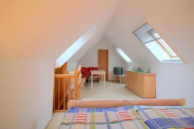 Ein Bett oder Betten in einem Zimmer der Unterkunft Feriendomizil am Hafen