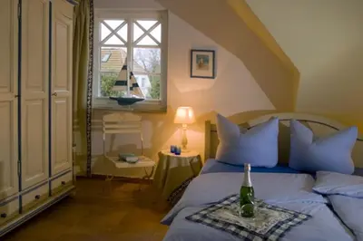 Ein Bett oder Betten in einem Zimmer der Unterkunft Piratenhus