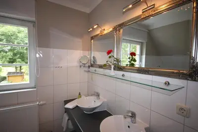Ein Badezimmer in der Unterkunft Ferienhaus Uhlenhus