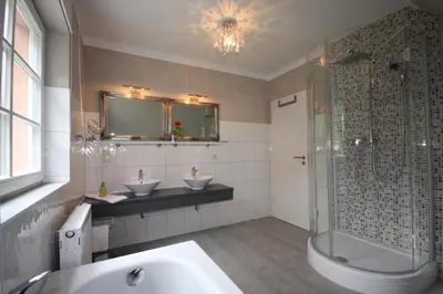 Ein Badezimmer in der Unterkunft Ferienhaus Uhlenhus
