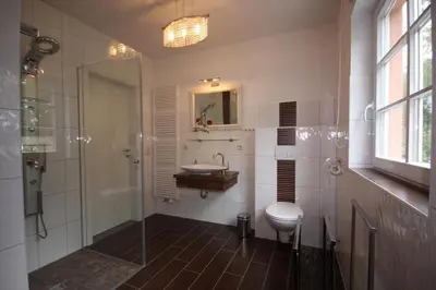 Ein Badezimmer in der Unterkunft Ferienhaus Uhlenhus