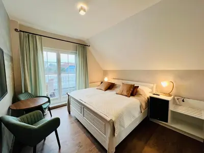 Ein Bett oder Betten in einem Zimmer der Unterkunft Haus Nordlicht