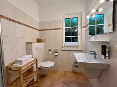 Ein Badezimmer in der Unterkunft Haus Nordlicht