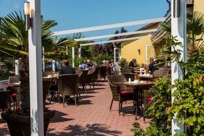 Ein Restaurant oder anderes Speiselokal in der Unterkunft Haus Nordlicht