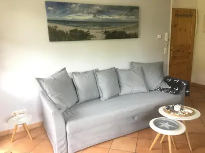 Ein Sitzbereich in der Unterkunft Haus Hugo