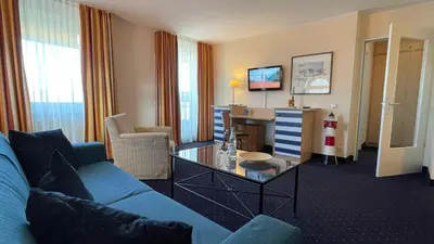 Ein Sitzbereich in der Unterkunft Hotel & Restaurant Seebrücke