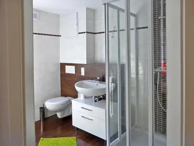 Ein Badezimmer in der Unterkunft Ferienwohnungen am Waldessaum