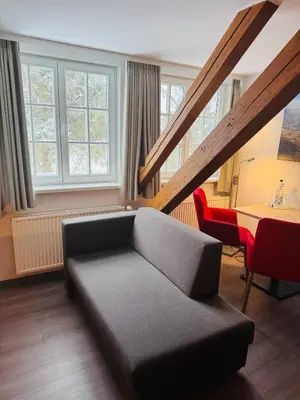Ein Sitzbereich in der Unterkunft Ferienhotel Alter Bahnhof garni