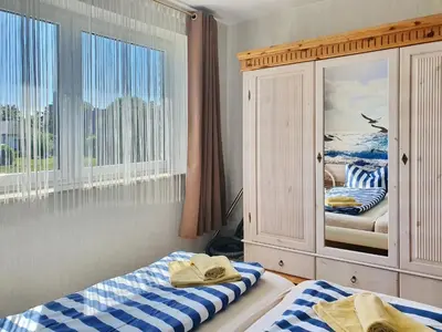Ein Bett oder Betten in einem Zimmer der Unterkunft An der Sonnenwiese