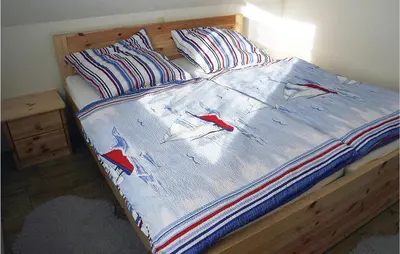 Ein Bett oder Betten in einem Zimmer der Unterkunft Lovely Home In Beiershagen With Wifi