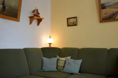 Ein Sitzbereich in der Unterkunft Ferienwohnungen am Bernsteinweg