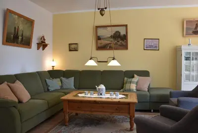 Ein Sitzbereich in der Unterkunft Ferienwohnungen am Bernsteinweg