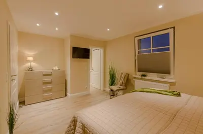 Ein Bett oder Betten in einem Zimmer der Unterkunft Grosse Kirr