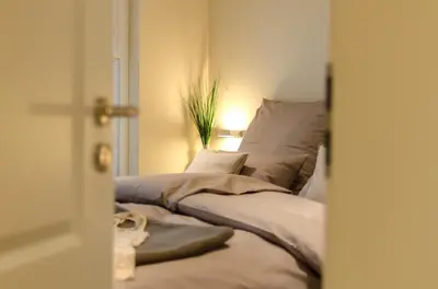 Ein Bett oder Betten in einem Zimmer der Unterkunft Grosse Kirr
