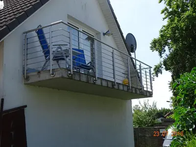 Ein Balkon oder eine Terrasse in der Unterkunft Galerie am Hafen